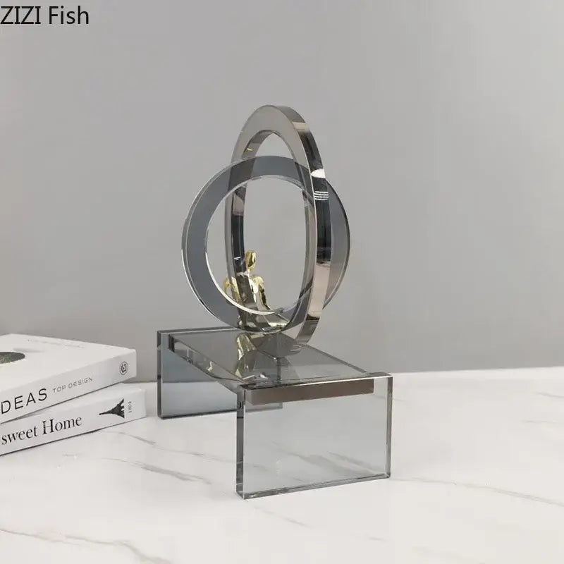 Modern geometric ring chair gold and chrome statue with interlocking rings and ring chair base on acrylic stand