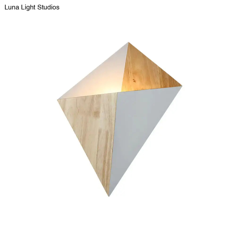 Modern geometric rubber wood wall sconce with diamond design and natural wood and matte white panels for bedroom