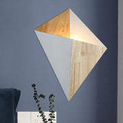 Modern geometric rubber wood wall sconce with triangular light wood and matte white panels for bedroom use