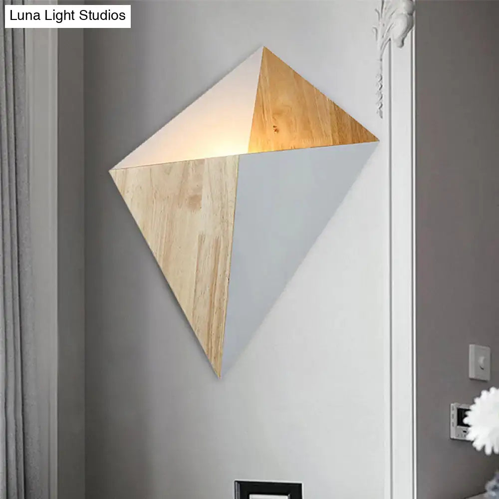 Modern geometric rubber wood wall sconce with triangular natural wood and matte white panels for bedroom use