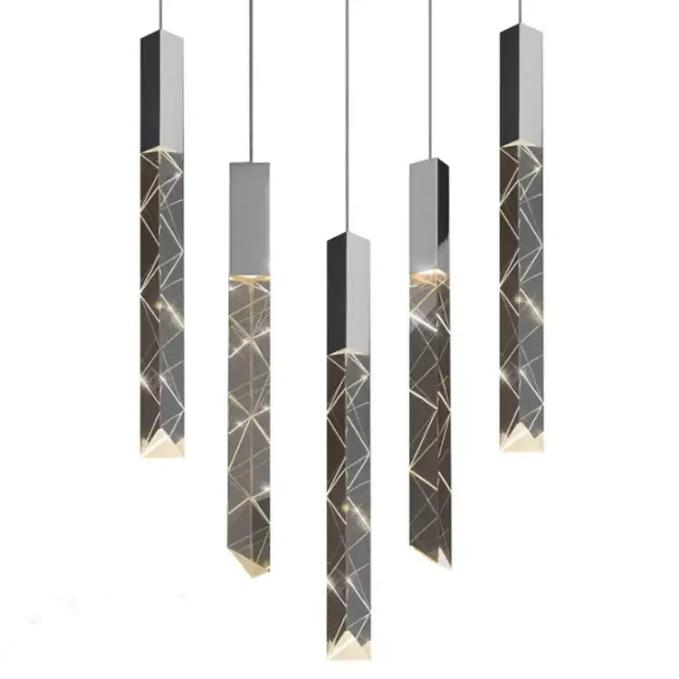 Modern geometric silver crystal glass led pendant light with gold accents providing warm dining room ambient decorbites light