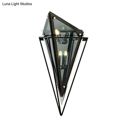 Modern geometric smoke gray led wall lamp with black metal and glass design featuring three exposed filament bulbs