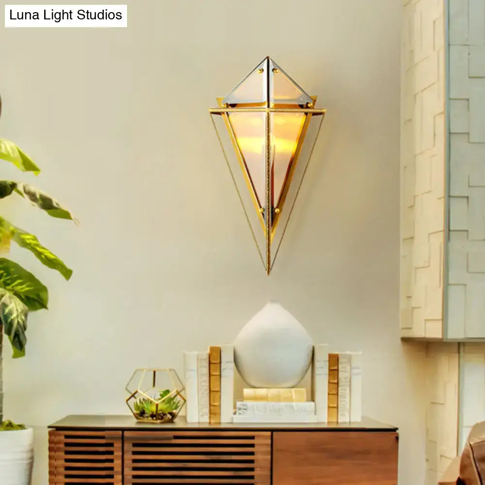 Modern geometric smoke gray led wall lamp with gold-toned metal frame and frosted glass panels for living room sconce