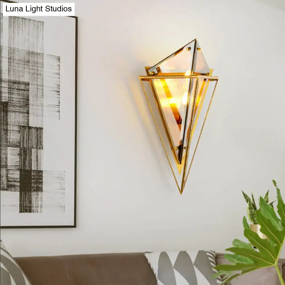 Modern geometric smoke gray led wall lamp featuring gold-toned triangular glass panels and an angular design wall sconce