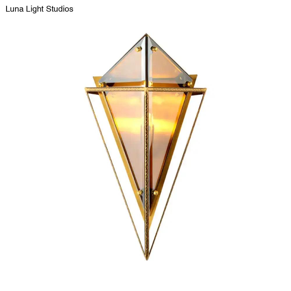 Golden geometric wall lamp with triangular glass panels and brass accents for modern smoke gray led wall lamp living room sconce