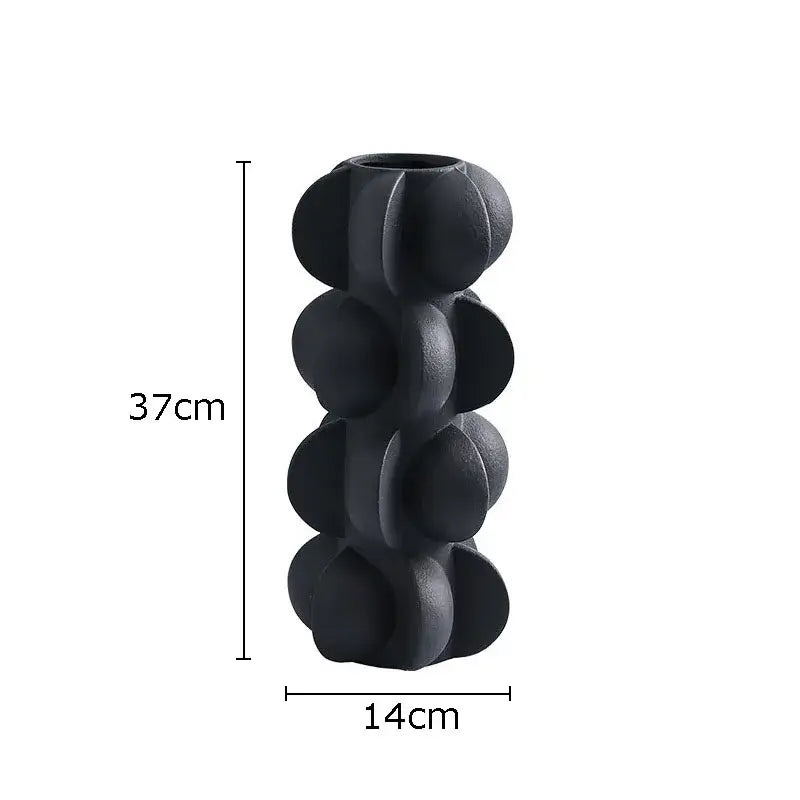 Black matte ceramic vase with segmented rounded design for modern geometric spiral resin living room decorbites decor