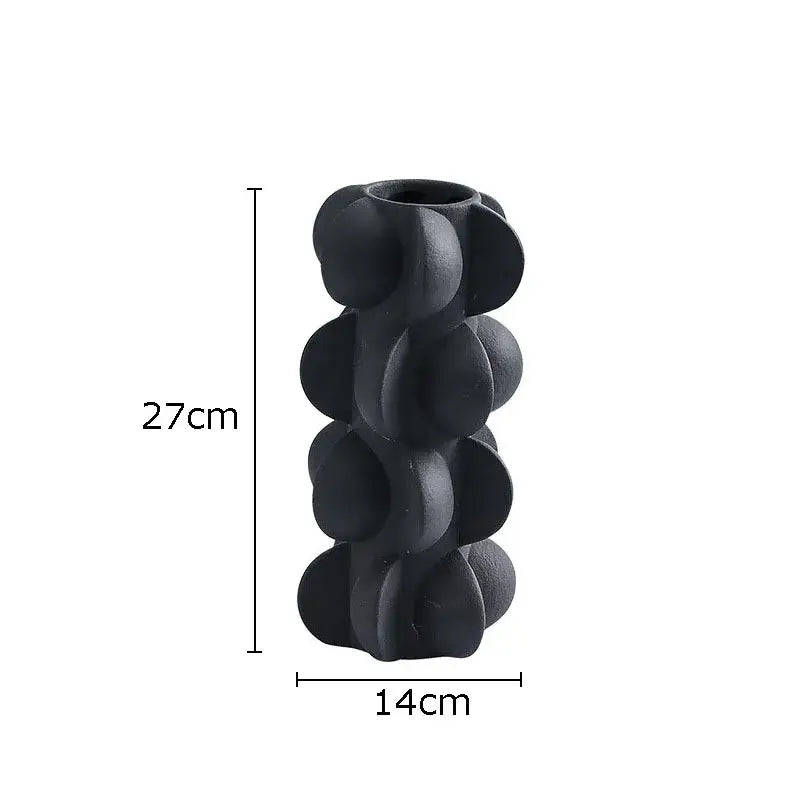 Black ceramic geometric spiral vase with textured rounded protrusions for modern living room decorbites decor
