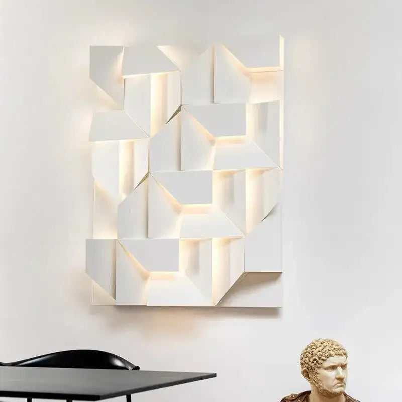 Modern geometric white grand sconce lamp with illuminated recessed panels for bedroom decor by decorbites grand sconce