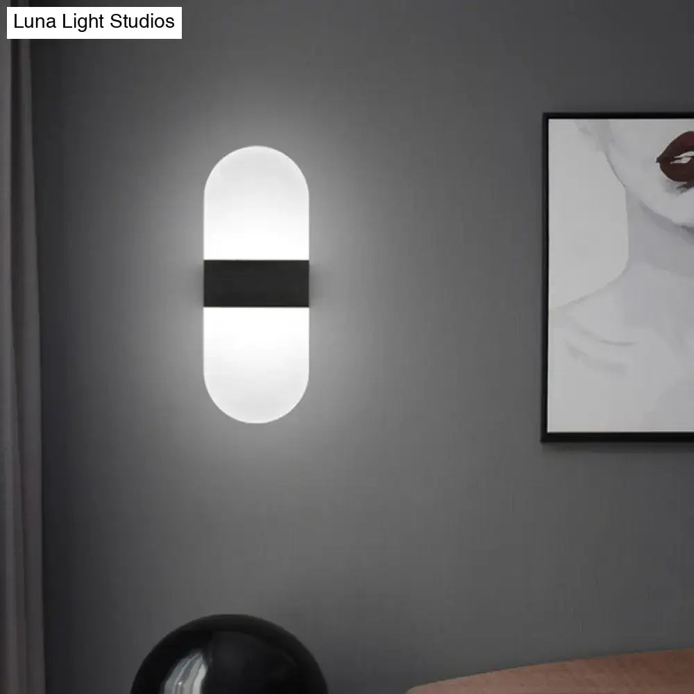 Modern geometric wood and acrylic wall sconce lamp with a sleek pill-shaped frosted glass wall sconce lamp