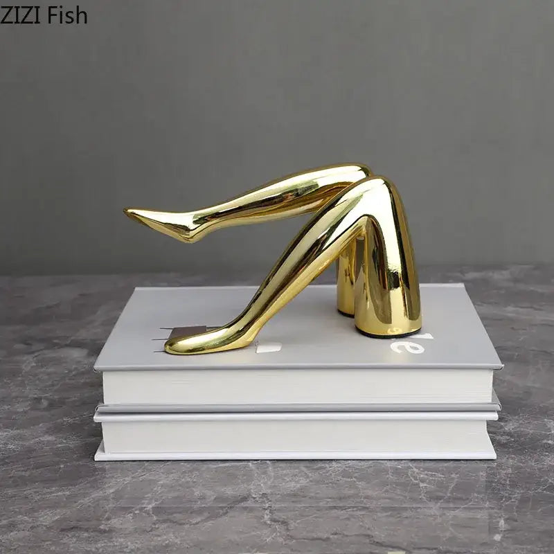 Shiny gold ceramic decorbites gilded lips and leg resin figurines sculpture of stylized crossed female legs for living room decor