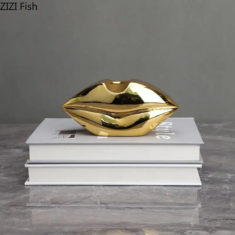 Shiny gold ceramic lips sculpture by zizi fish featuring gilded lips and leg resin figurines living room decorbites resin figurines sculpture