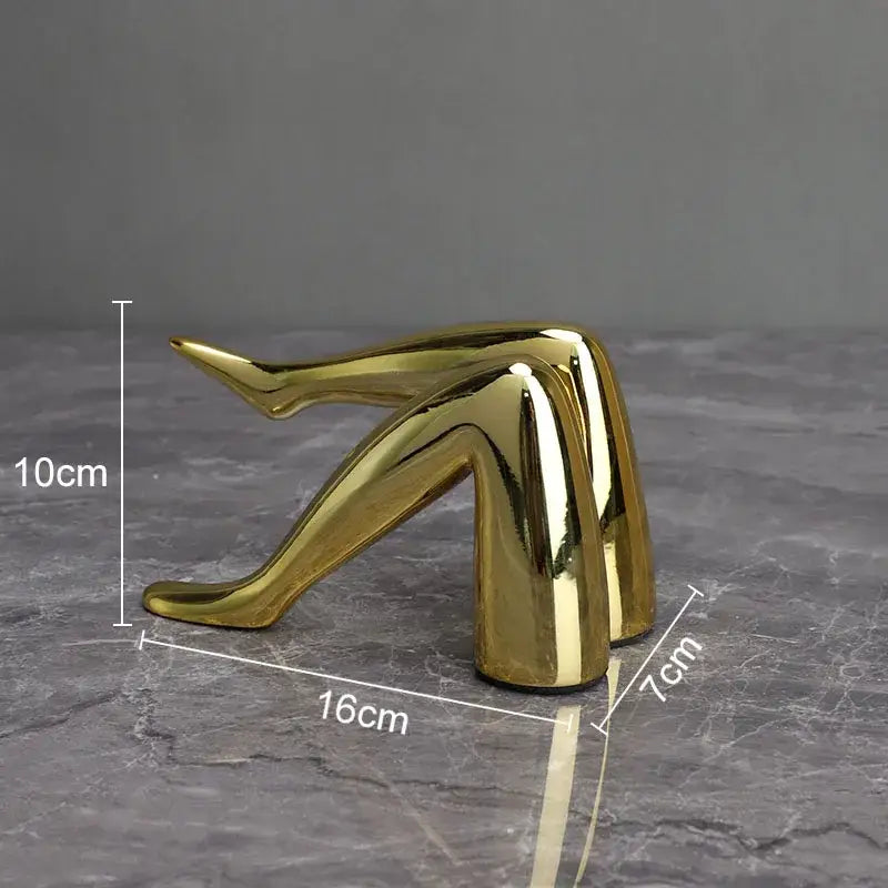 Modern gilded lips and leg resin figurines sculpture features golden ceramic stylized human legs in seated pose for decorbites living room decor