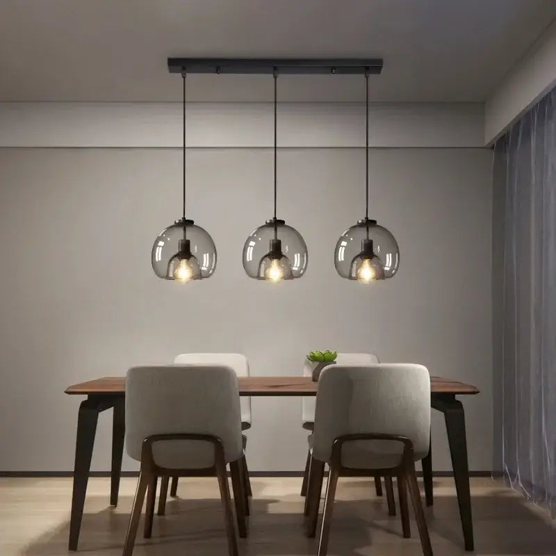 Modern glass ball led pendant lights with smoked glass globes and black metal hardware for dining room decorbites pendant lights