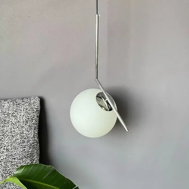 Modern glass ball pendant light with frosted white glass shade and chrome arms for dining room decorbites pendant light