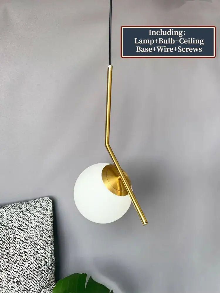 Modern glass ball pendant light with sleek gold metal arm and opaque white glass shade for dining room decorbites pendant light
