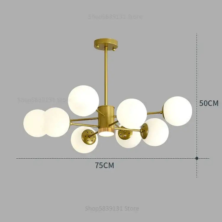 Modern brass-finished decorbites glass ball pendant lights with frosted globe shades for gold and black living room chandelier