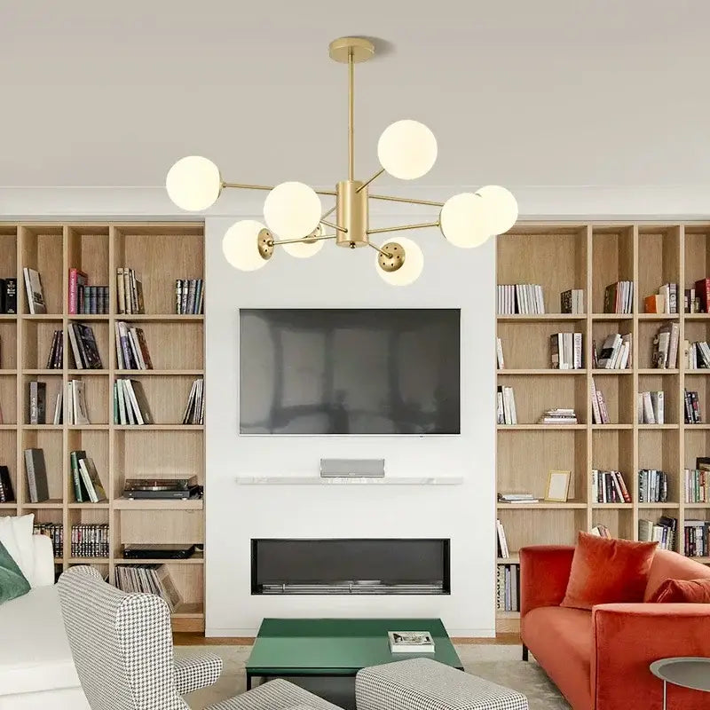 Gold-toned modern glass ball pendant chandelier with multiple frosted glass globes for living room decorbites pendant lights
