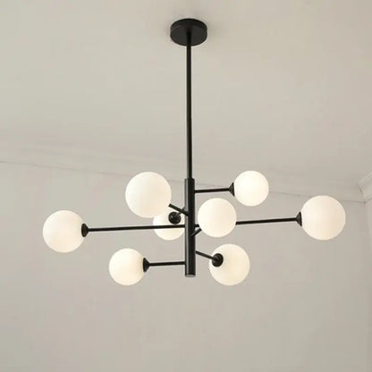 Modern black metal decorbites glass brass chandelier with frosted white spherical glass globes for living room decor