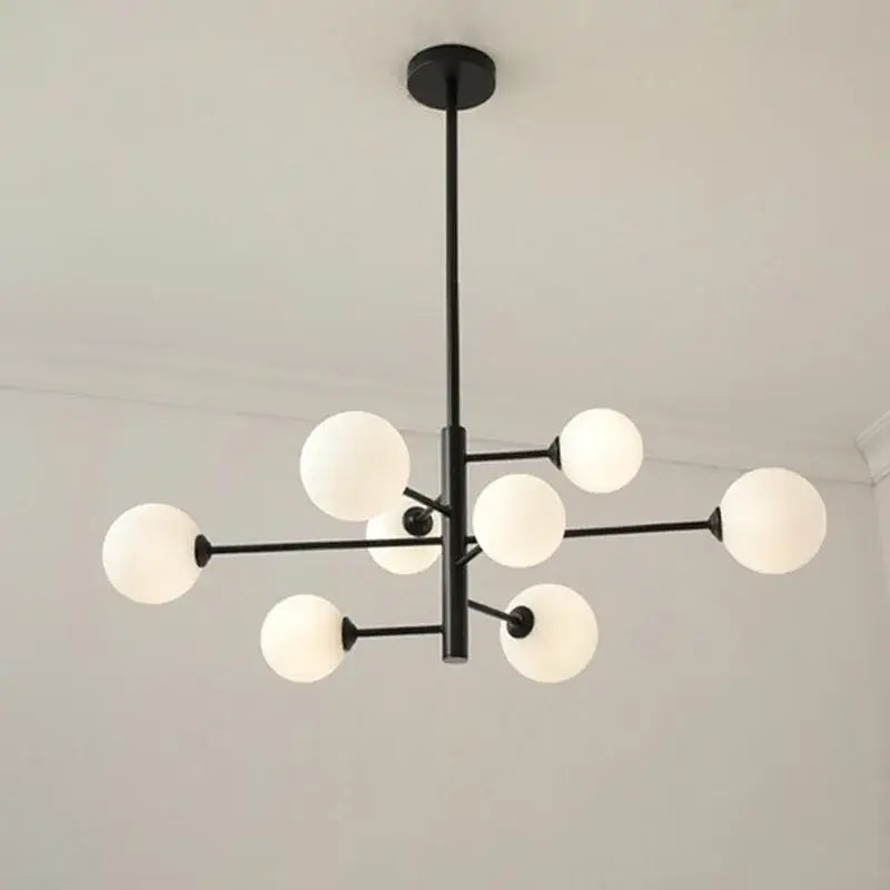 Modern black metal decorbites glass brass chandelier with frosted white spherical glass globes for living room decor