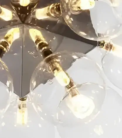 Modern glass bubble led hanging lamp with clear glass globe bulbs and brass metal arms for living room decorbites glass bubble