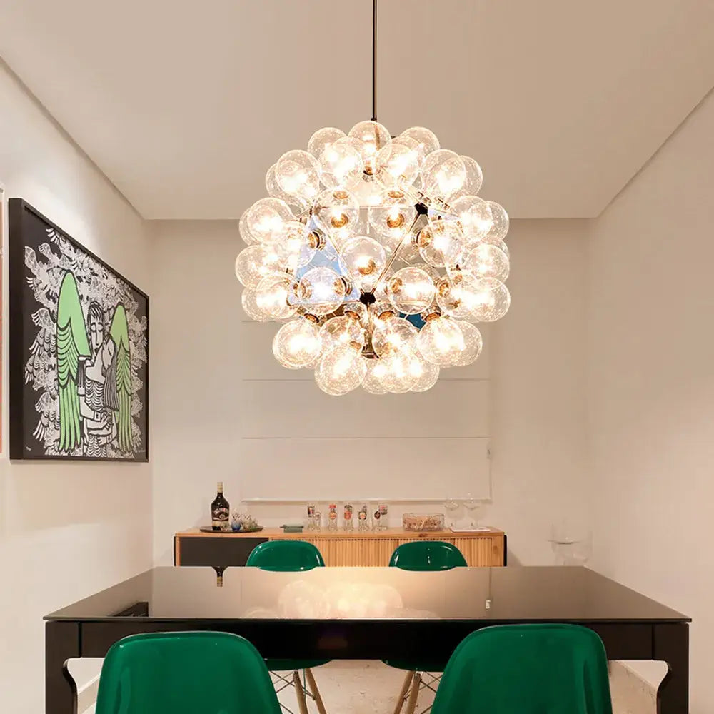 Modern glass bubble led hanging lamp featuring clear glass bulbs clustered around a brass central fixture for living room decorbites glass bubble
