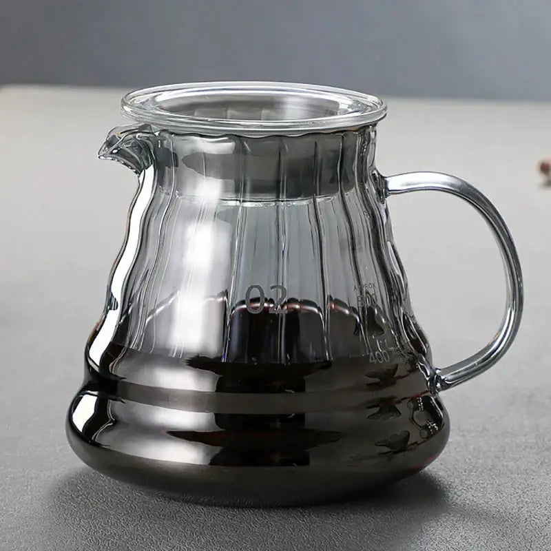 Modern glass coffee carafe with fluted ribbed clear glass body and metallic handle for decorbites glass coffee use