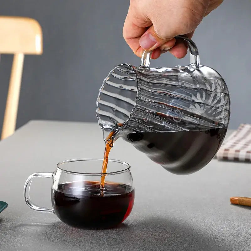 Modern glass coffee carafe with ribbed textured surface and curved handle for decorbites glass coffee pour over pot
