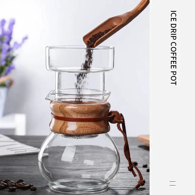 Modern glass coffee kettle dripper with clear glass body warm wood collar and leather tie for decorbites glass coffee use