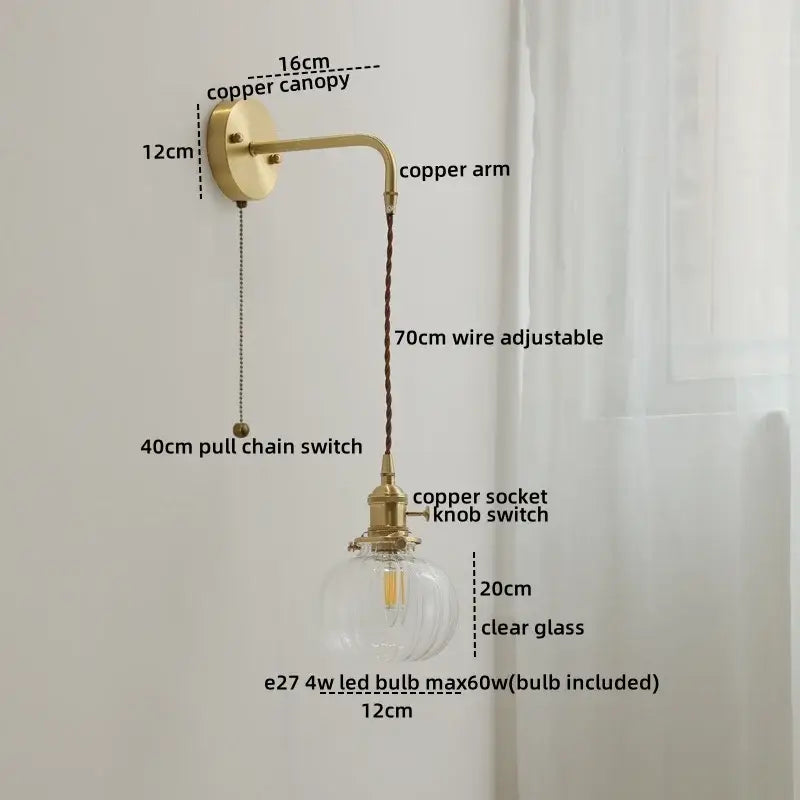 A vintage-style copper led wall light with clear glass bulb holder and adjustable wire for bedroom use