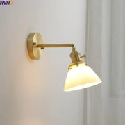 Brass-finished wall-mounted glass copper led wall light with warm frosted shade for modern bedroom reading