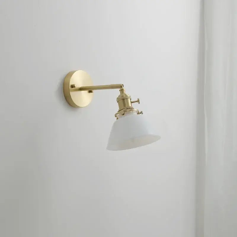 Gold-toned modern wall lights with frosted glass copper led shade for bedroom reading and ambient lighting
