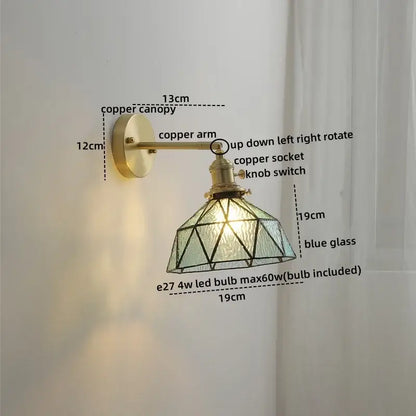 Vintage-style copper led wall light with geometric blue glass shade ideal for bedroom reading and modern decor