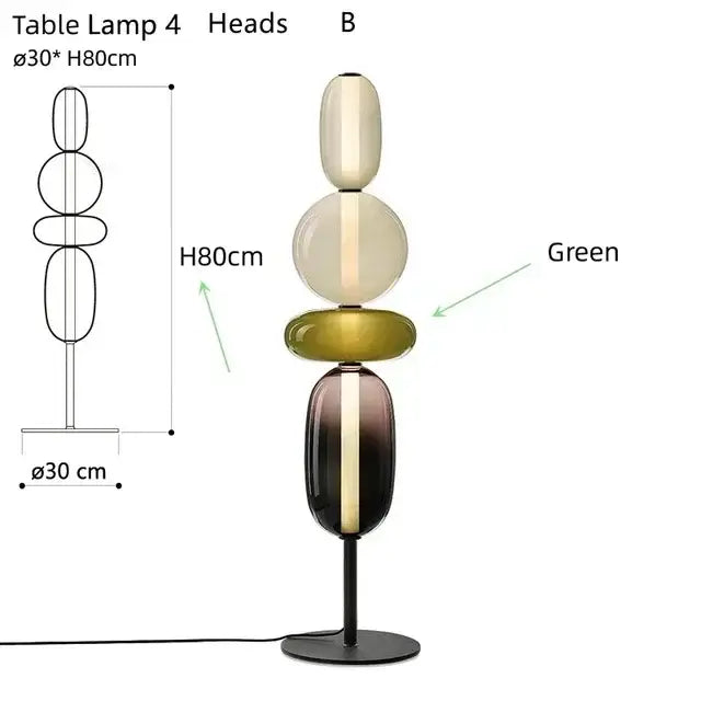 Elegant modern glass floor lamp with stacked oval orbs in cream olive green and dark amber on black metal base with led light
