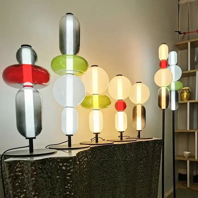 Modern glass floor lamp set of 3 with stacked globe lamps in red green white and metallic silver translucent shades