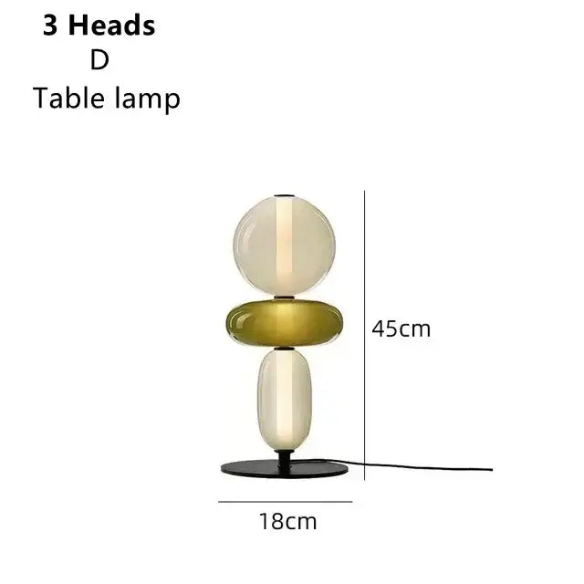 Modern glass floor lamp set of 3 with three-headed floor lamp led featuring stacked cream and olive glass orbs on black base