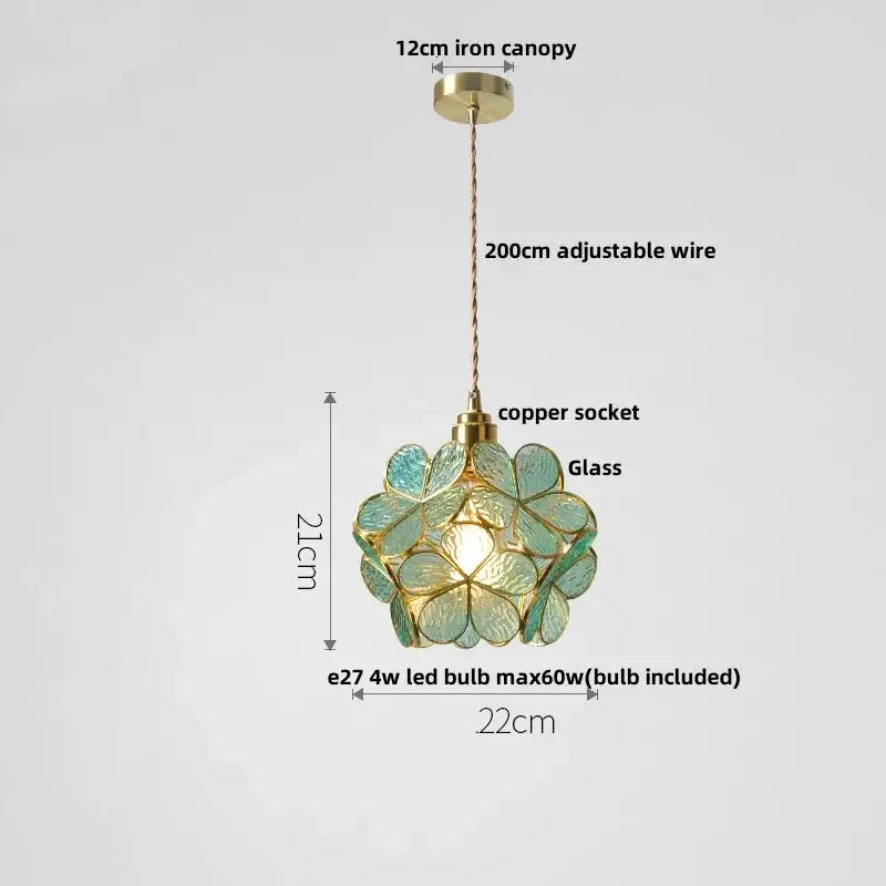 Delicate light blue glass flower led pendant light with floral design and brass accents for modern dining room