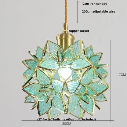 Modern glass flower led pendant light in teal with gold metal accents and copper socket for dining room lighting