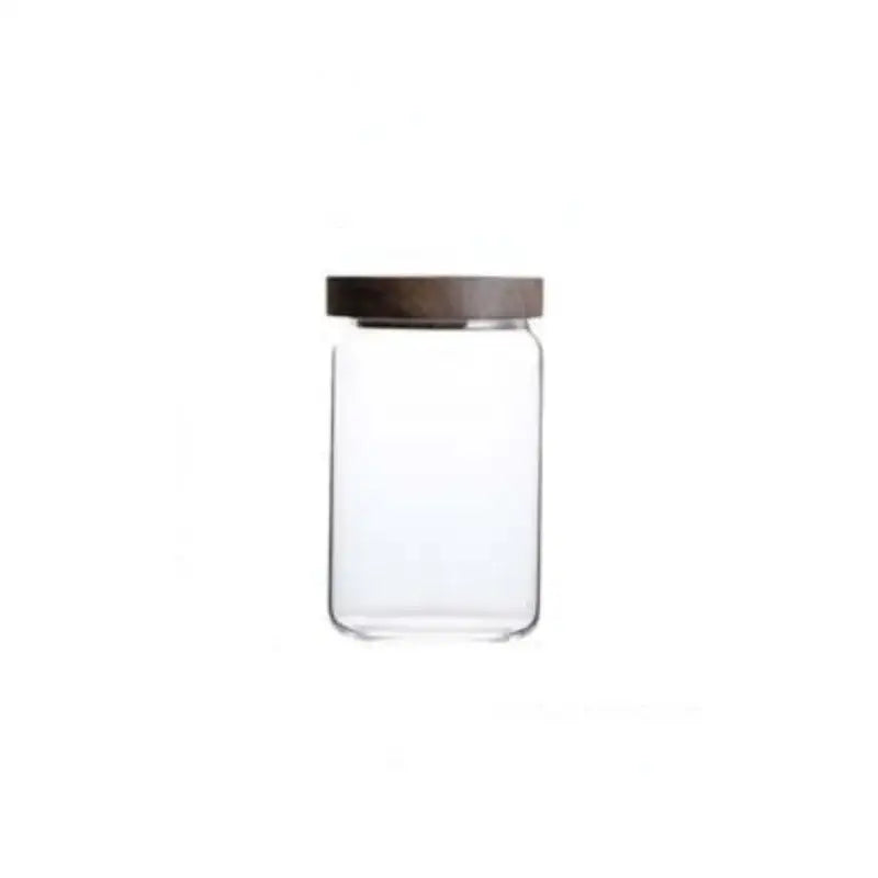 Clear glass hermetic storage jar with dark brown wooden airtight lid by decorbites for kitchen use