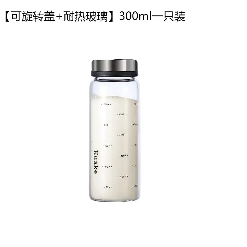 Modern glass seasoning spice shaker salt pepper bottle clear glass with silver rotating lid and black measurement markings kuake