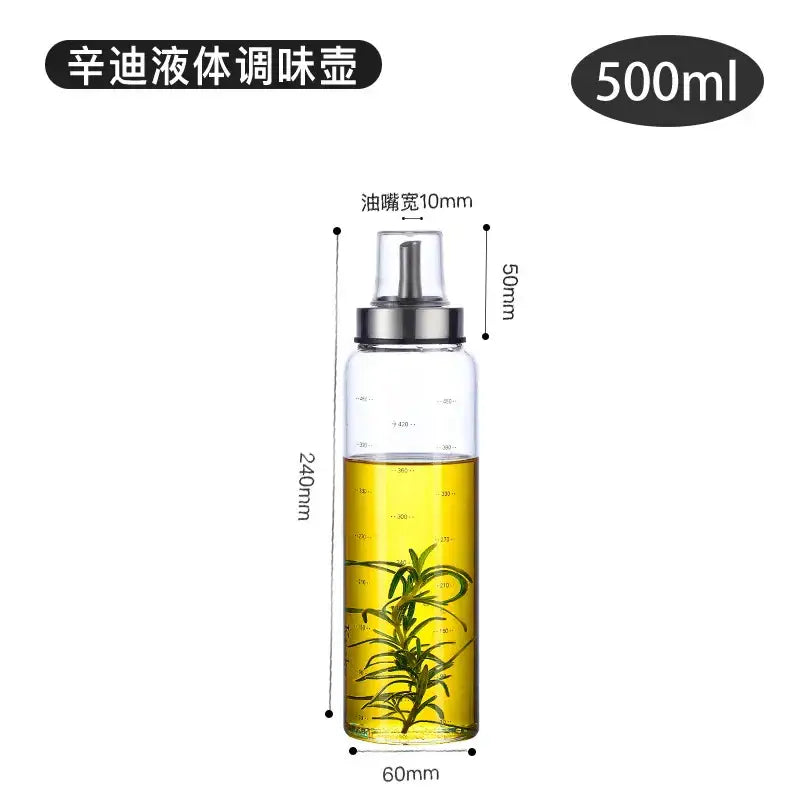Modern glass seasoning storage bottle with silver spray nozzle containing golden olive oil and fresh rosemary sprigs