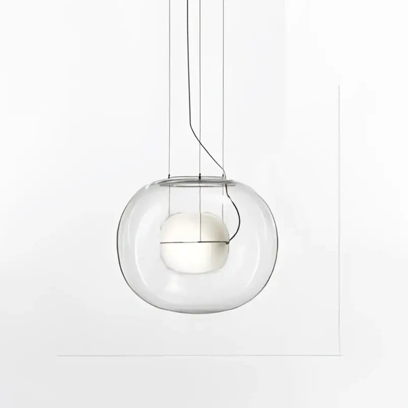 Modern glossy black glass ball pendant light featuring a clear glass globe and sleek minimalist design for dining room decorbites brokis big