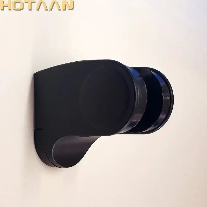 Modern glossy black shower holder with curved black plated abs design for wall mounted bathroom use by decorbites