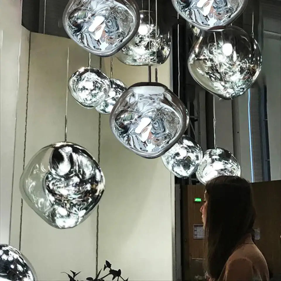 Modern glossy copper glass lava led pendant lights with shiny chrome finish hang from ceiling for elegant decorbites glass lava decor
