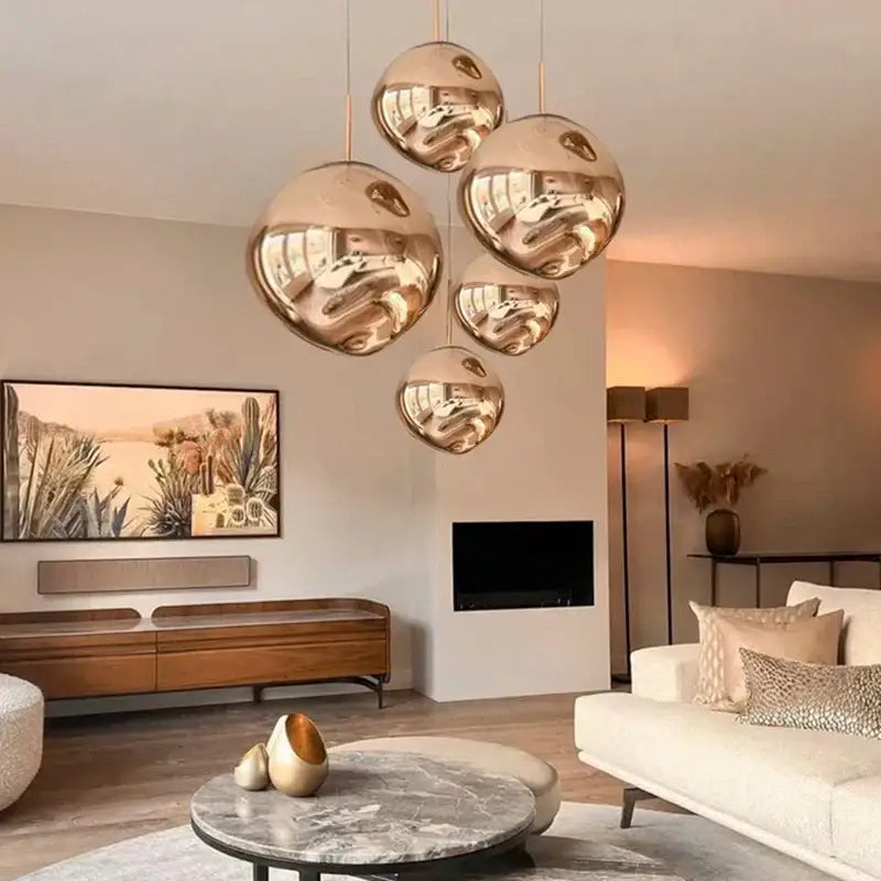 Glossy copper glass lava led pendant lights with reflective spherical design for modern living room decorbites decor