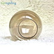 Modern glossy gold grey glass lamp shade with a reflective spherical design and central circular opening for decorbites grey glass lamp