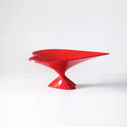 Vibrant red glossy ceramic pedestal bowl with sculpted asymmetrical design for decorbites geometric fruit plate jewelry use