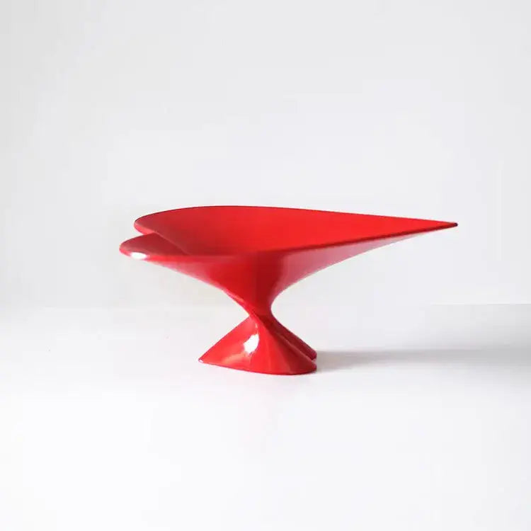 Vibrant red glossy ceramic pedestal bowl with sculpted asymmetrical design for decorbites geometric fruit plate jewelry use