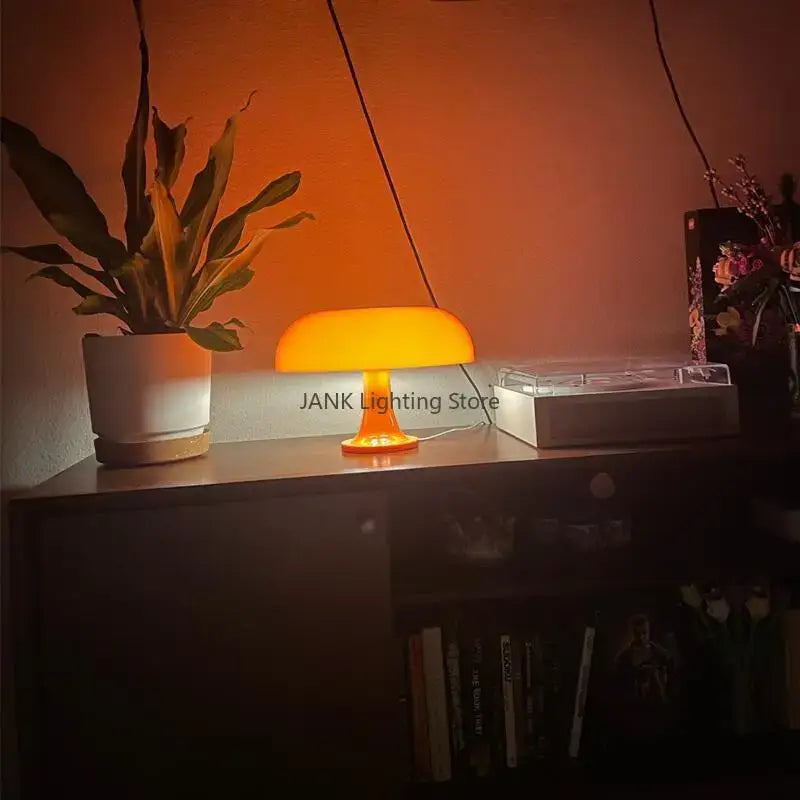Modern glossy orange mushroom table lamp with translucent glass shade and amber base for bedroom led lighting