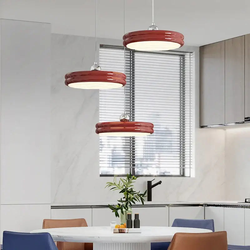 Three vibrant red glossy circular dimmable pendant lights ideal for modern dining room decorbites circular dimmable design