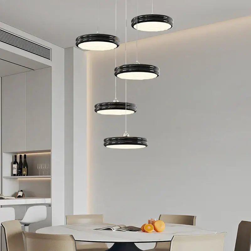 Modern black circular dimmable pendant light with sleek minimalist design for dining room decorbites circular dimmable